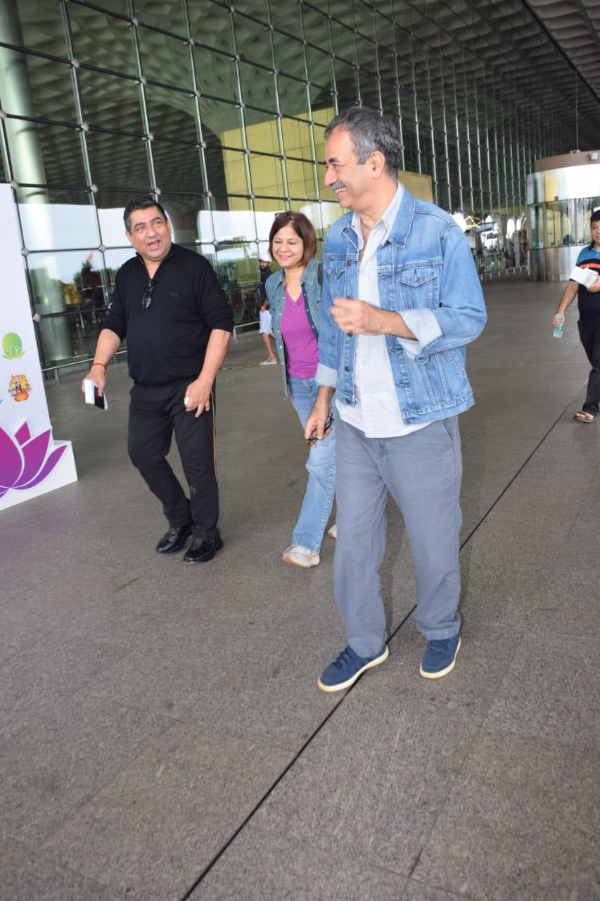 Rajkumar Hirani was pictured at the airport along with this wife. The couple looked excited for the adventure they were on their way to